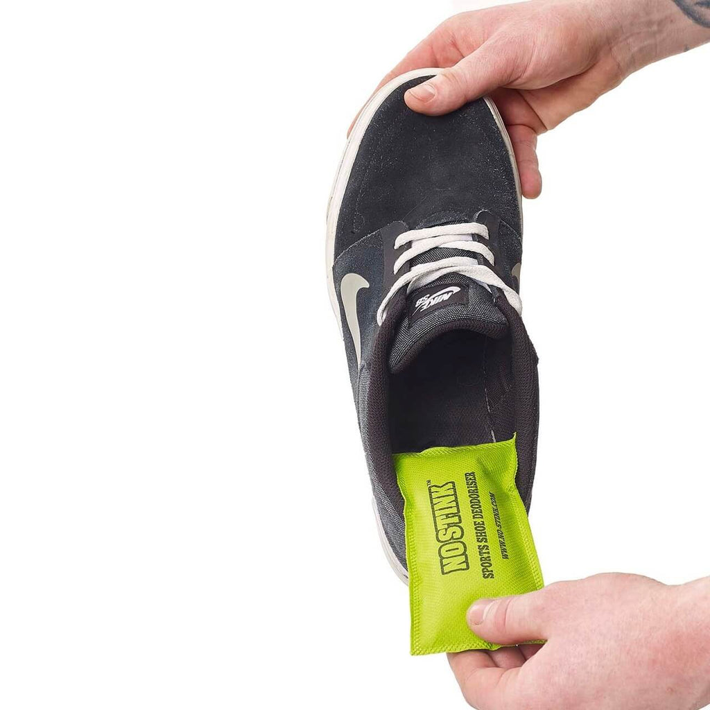 No Stink Sports Shoe Deodorisers being inserted into a shoe