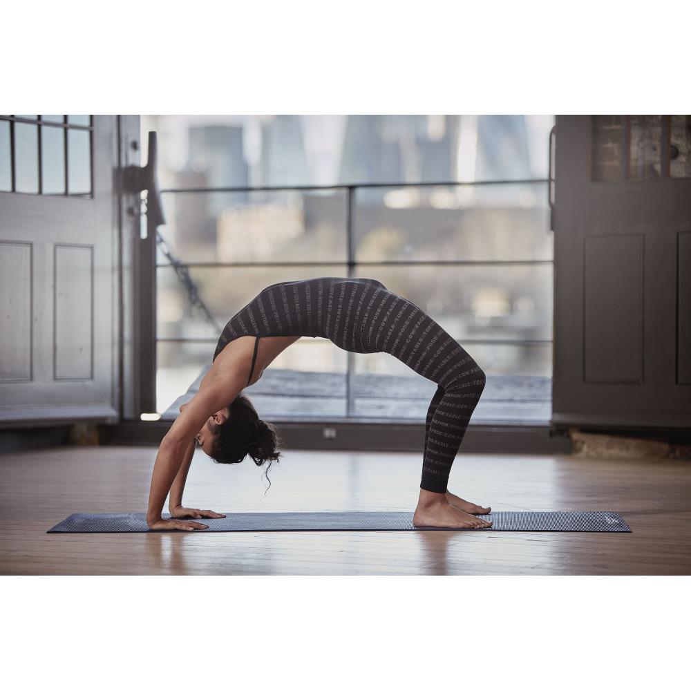 Woman doing a yoga pose on a Reebok 4mm Yoga Mat -  Brush Strokes