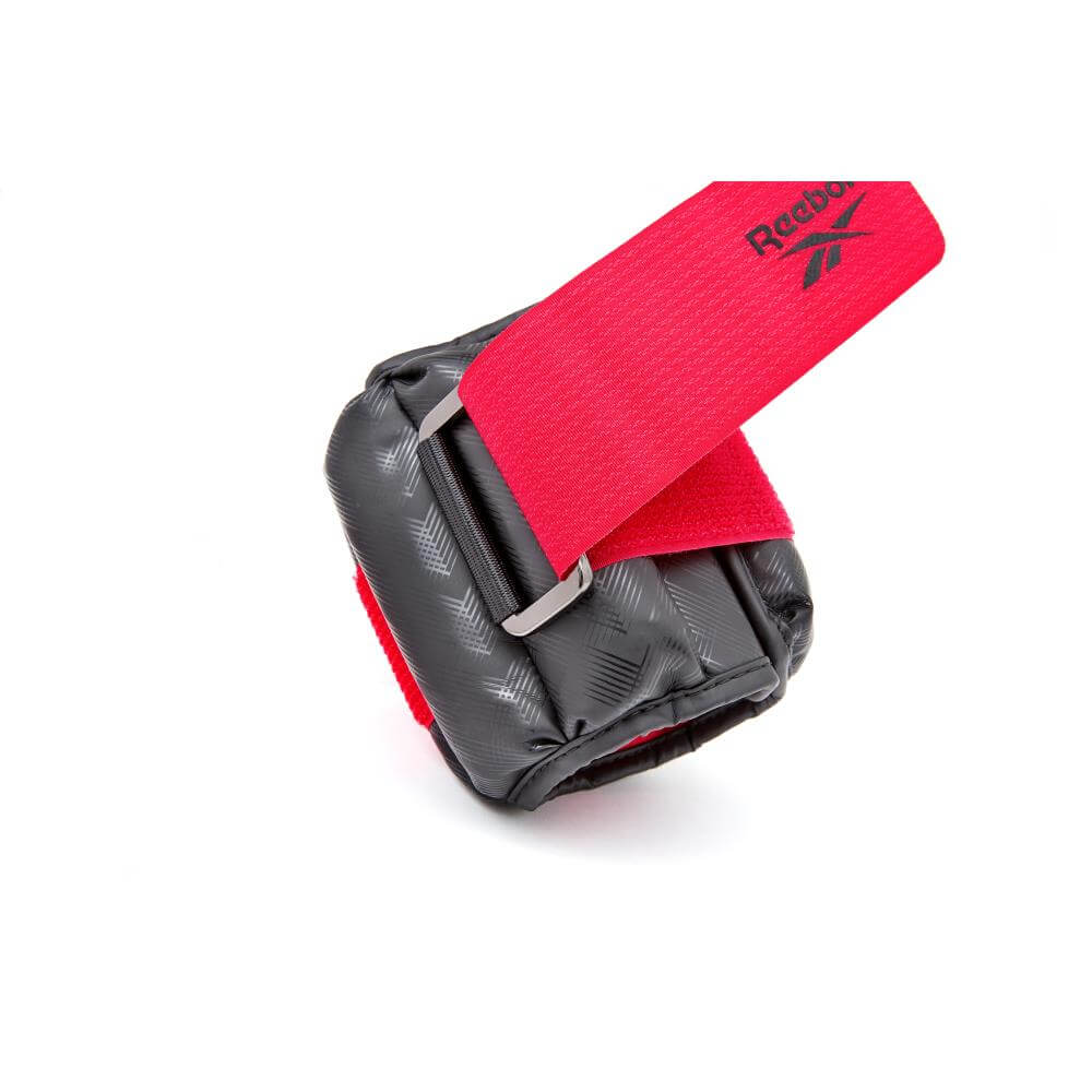 Buckle on the 1.5kg Reebok Premium Ankle/Wrist Weights
