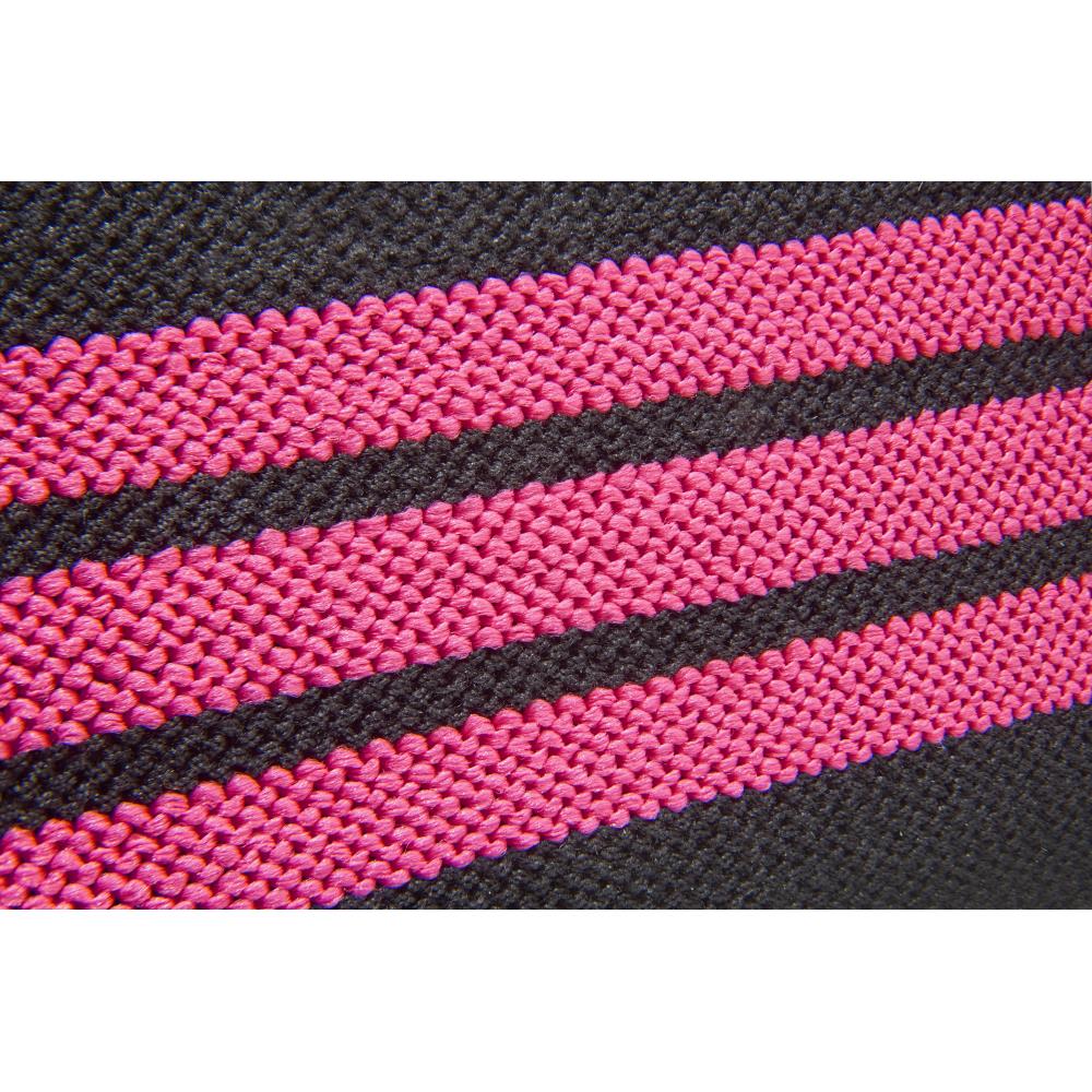 Close-up of pink and black striped fabric from adidas wrist wraps