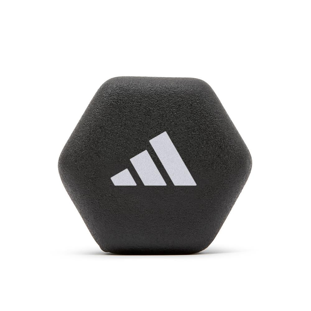 Black hexagonal weight with Adidas logo on a white background