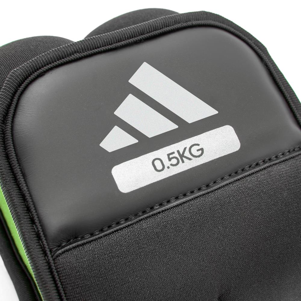 Black ankle/wrist weight with Adidas logo and '0.5KG' label on a white background