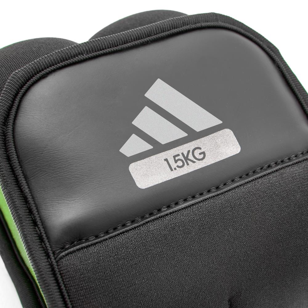 Black ankle/wrist weight with Adidas logo and '1.5KG' label on a white background