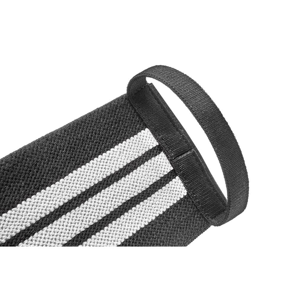 Close-up of a black and gray striped  adidas wrist wraps on a white background