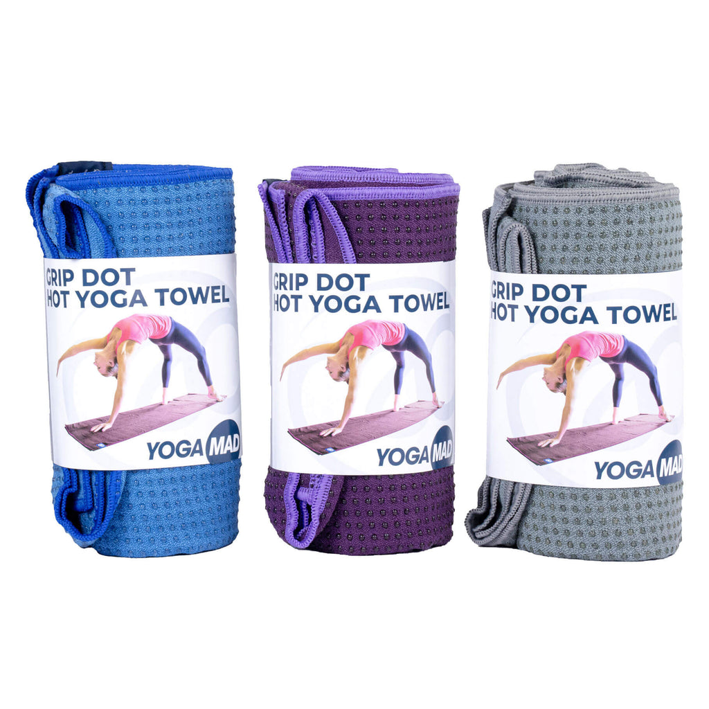 Three yoga towels in blue, purple, and gray with 'Yoga Mad' branding on a white background.