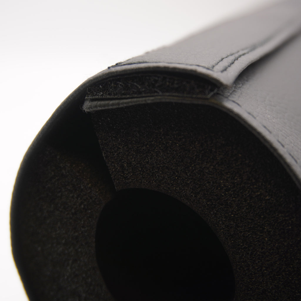 Hook and loop attachment on barbell pad