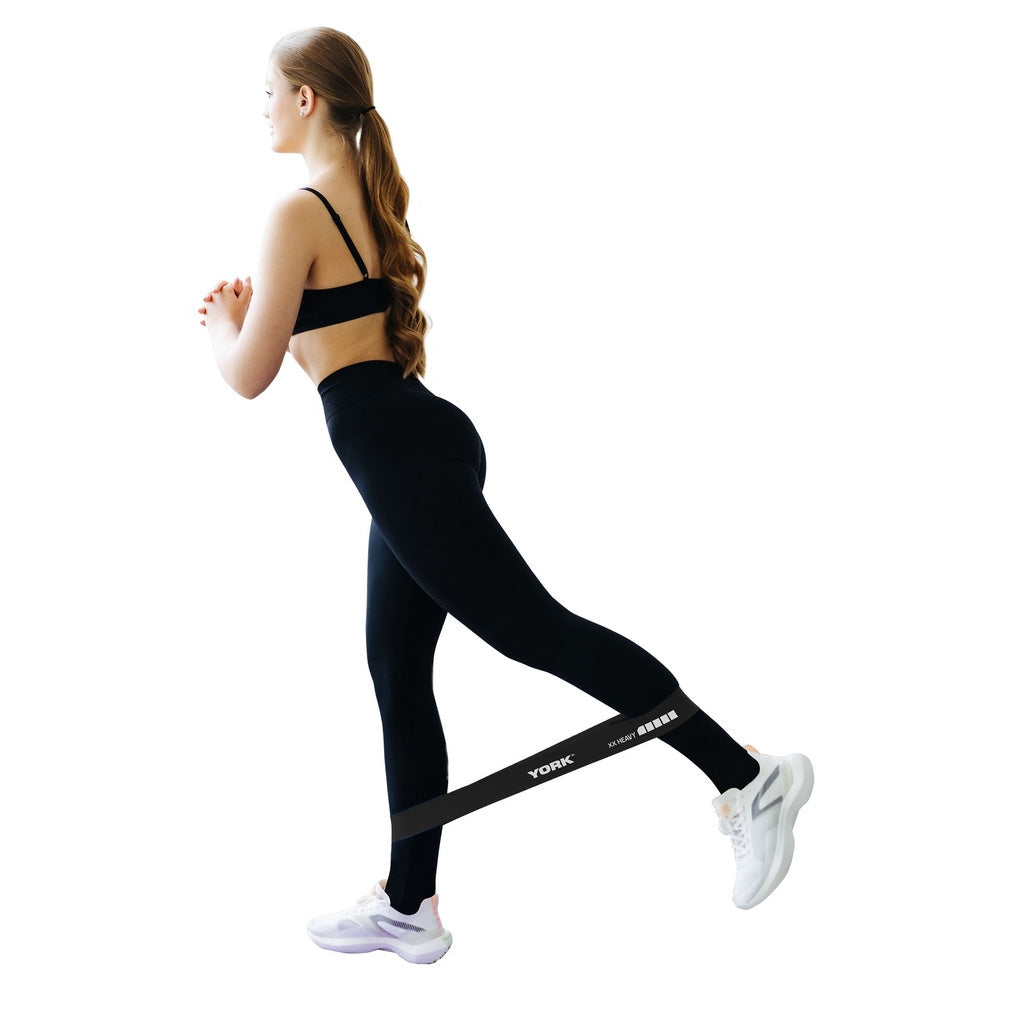 Woman exercising with the XX-Heavy York resistance loop