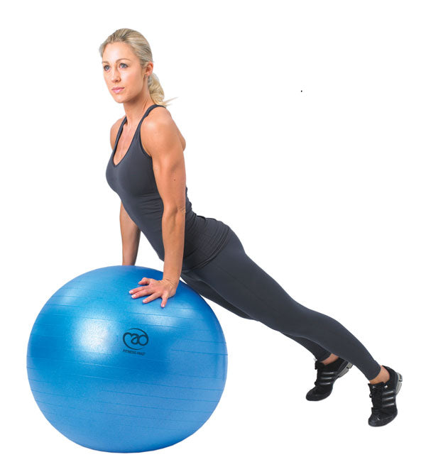 Woman exercising using a Fitness Mad Studio Swiss Ball - 75cm