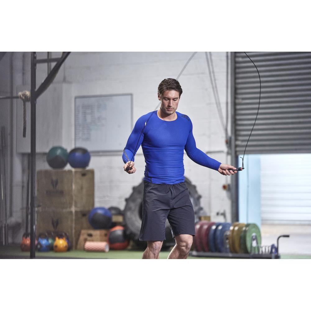 Man skipping in the gym using and adidas Jump Rope 