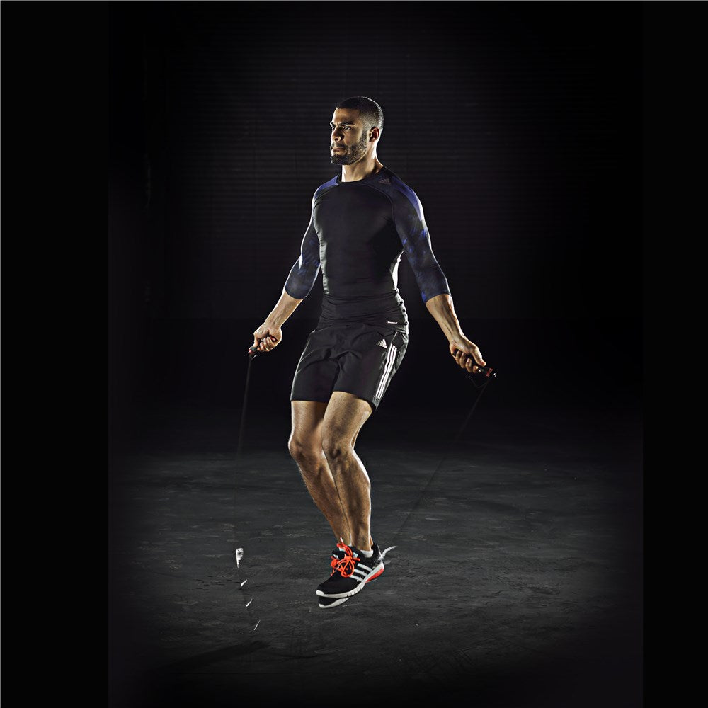Man skipping using an adidas Jump Rope 