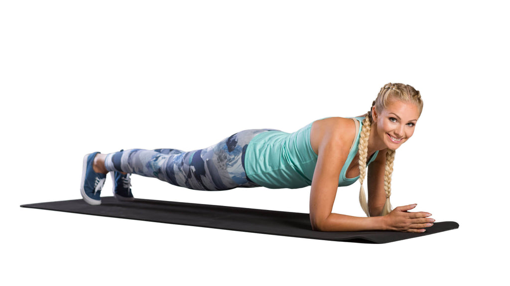 Woman performing a plank on an Azure 4mm Firm Training Mat 