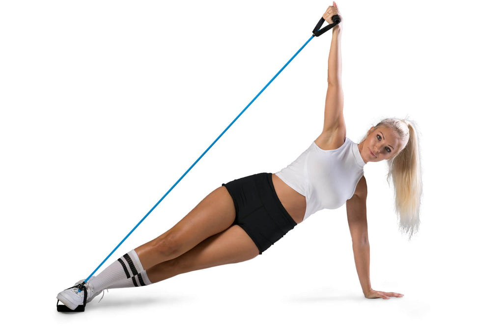Woman exercising with an Azure Tone Trainer Resistance Tube