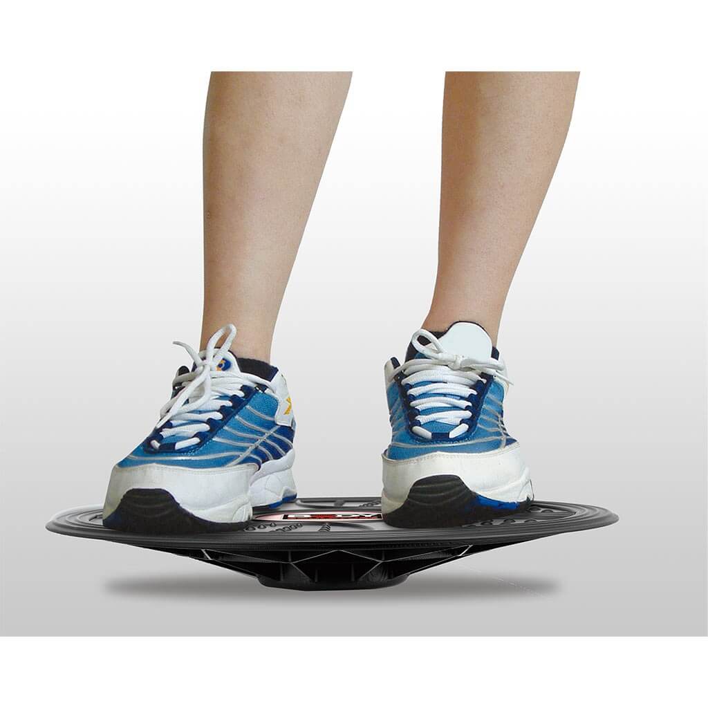 Woman standing on a Body Sculpture adjustable wobble board
