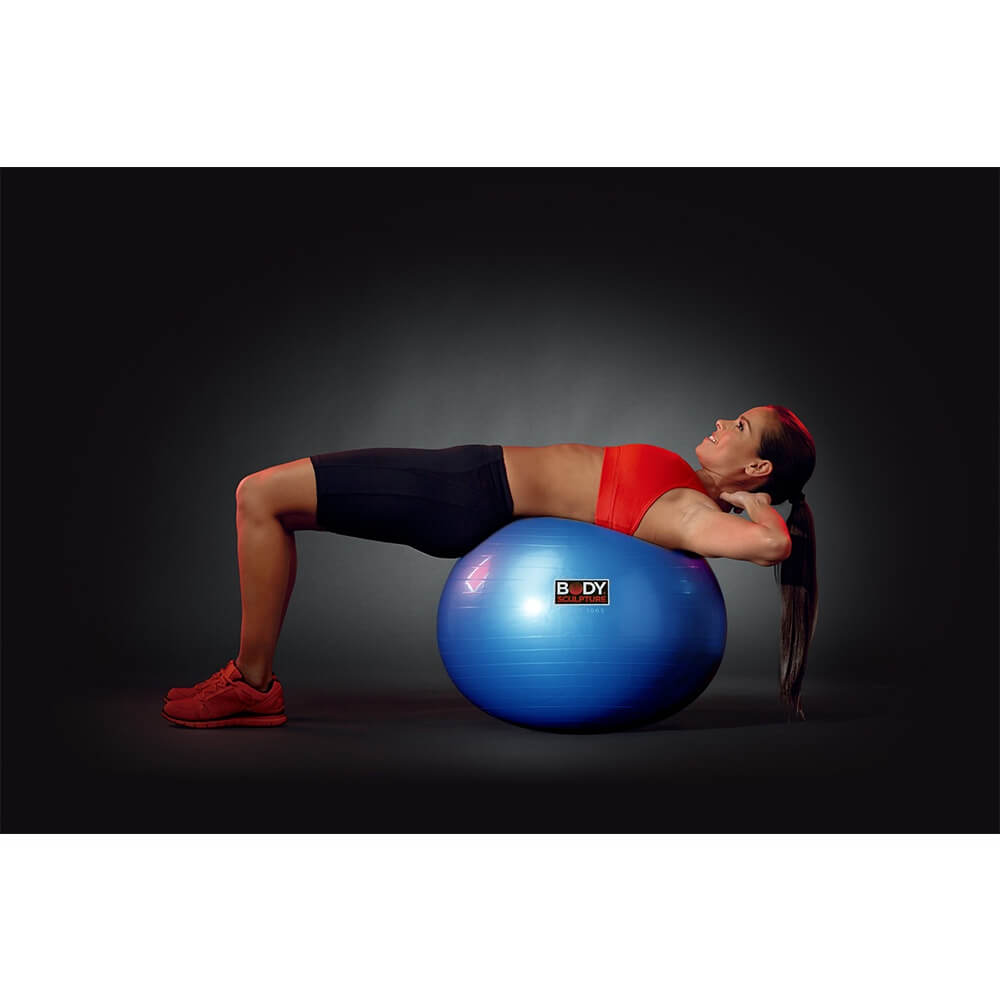 Woman exercising on a body-sculpture-gym-ball-65cm