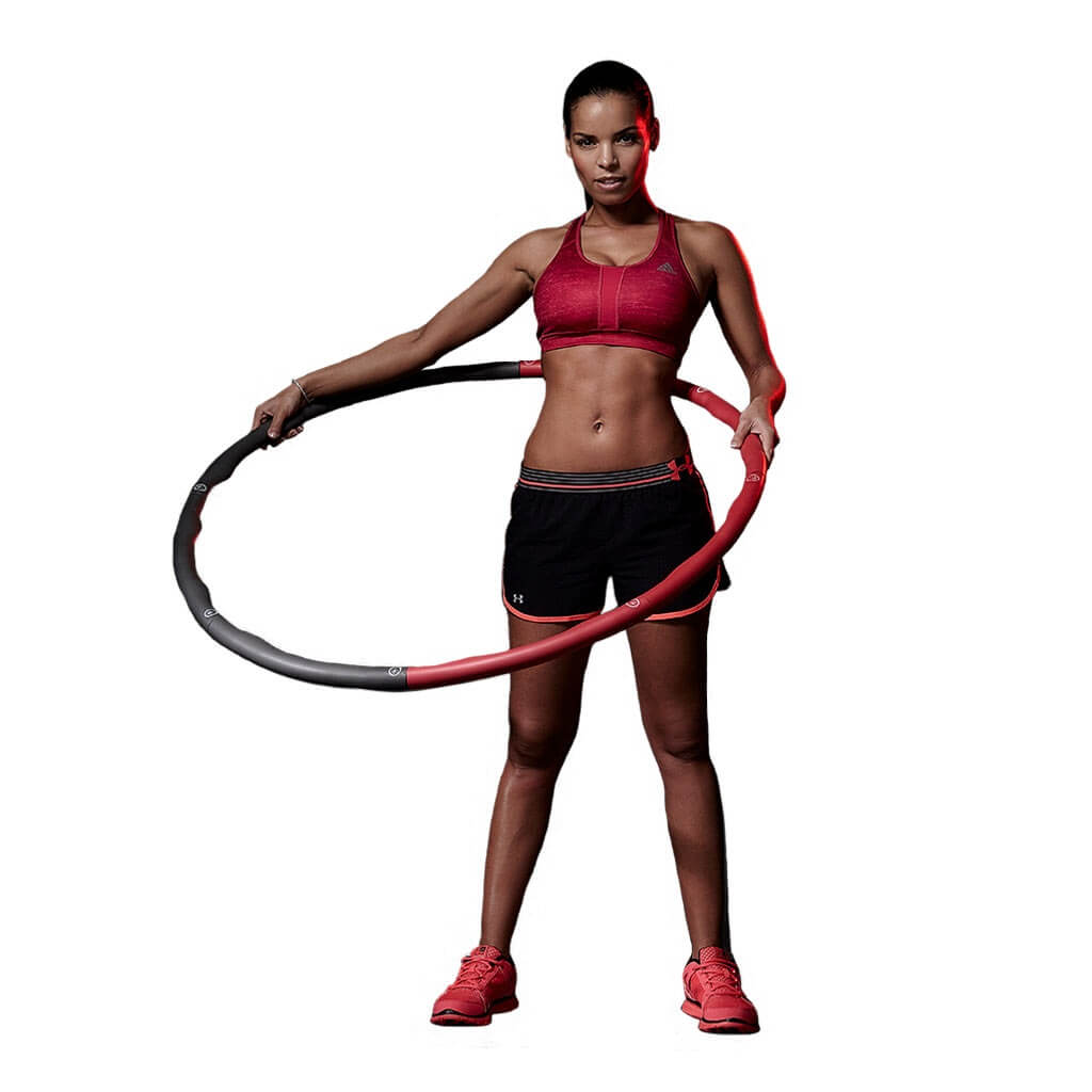 Woman exercising using a Body Sculpture Weighted Hula Hoop