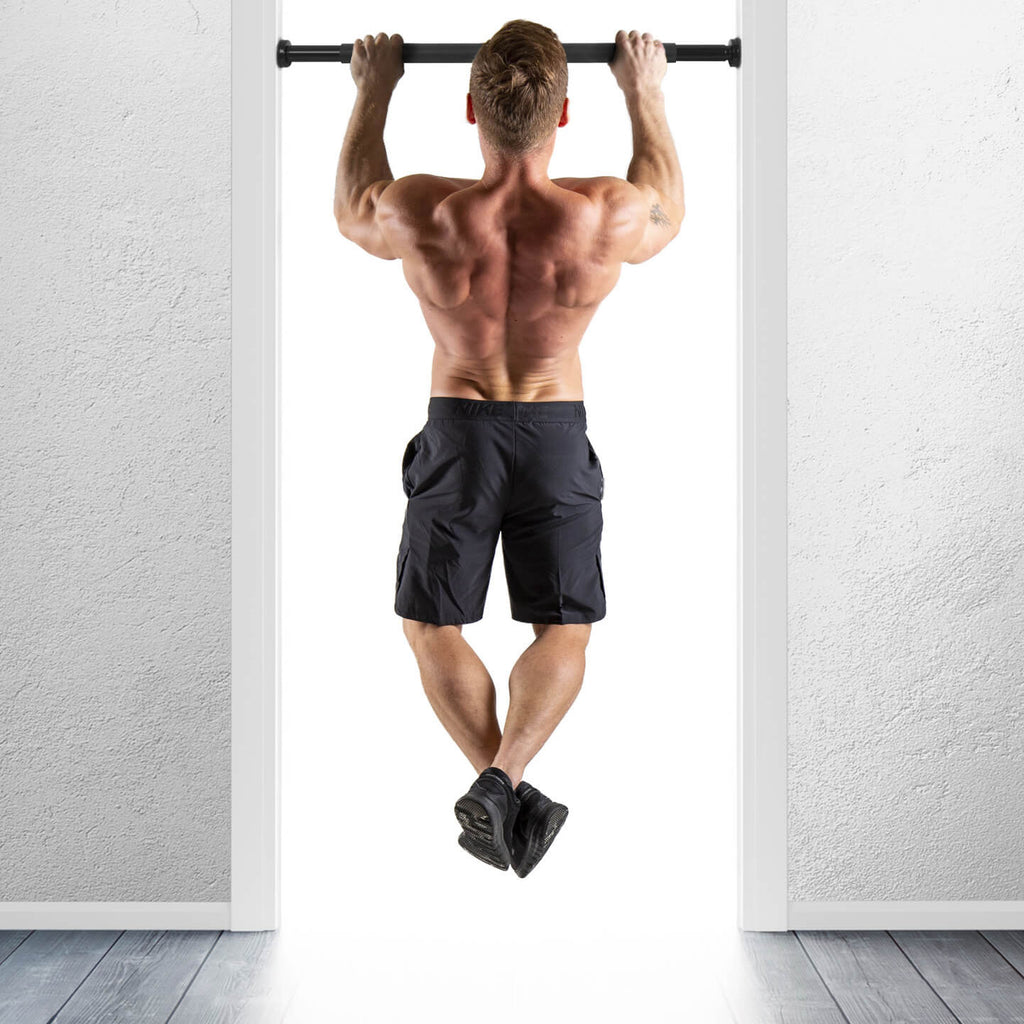 Man performing chin ups in a doorway using a HXGN Chin Up Bar - Pull Ups