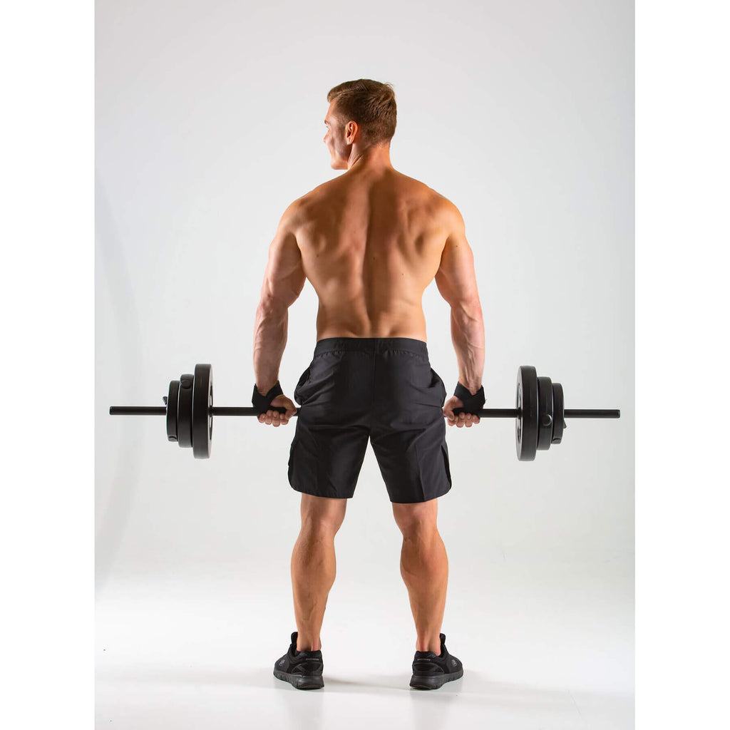 Man performing a barbell grip whilst wearing HXGN Weight Lifting Straps 