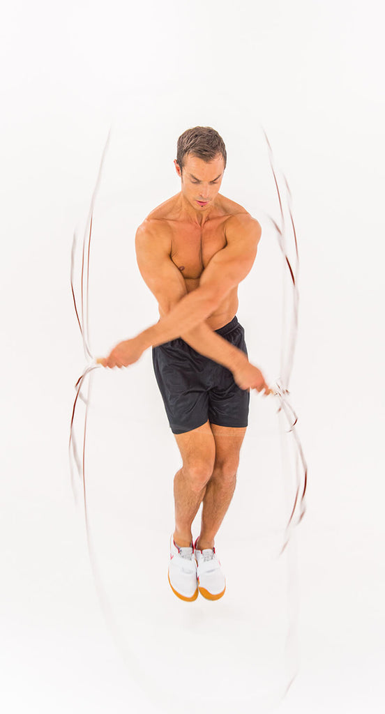 Man skipping with Iron Gym Wire Skipping Rope - Double Unders