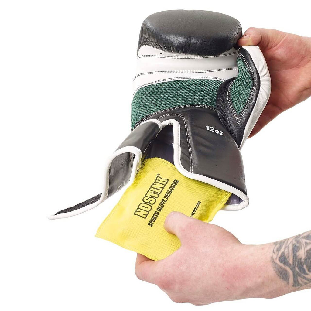 No Stink Sports Glove Deodoriser being inserted into a boxing glove