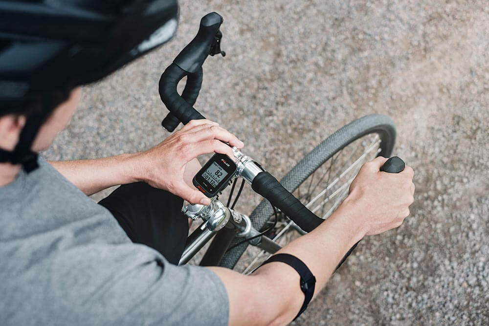 Cyclist wearing Polar OH1 Arm Heart Rate Monitor