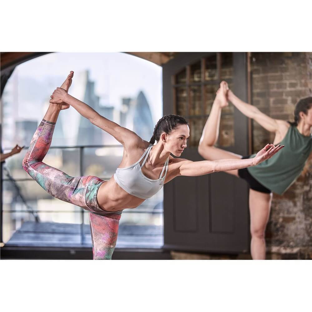 Yoga class performing yoga poses