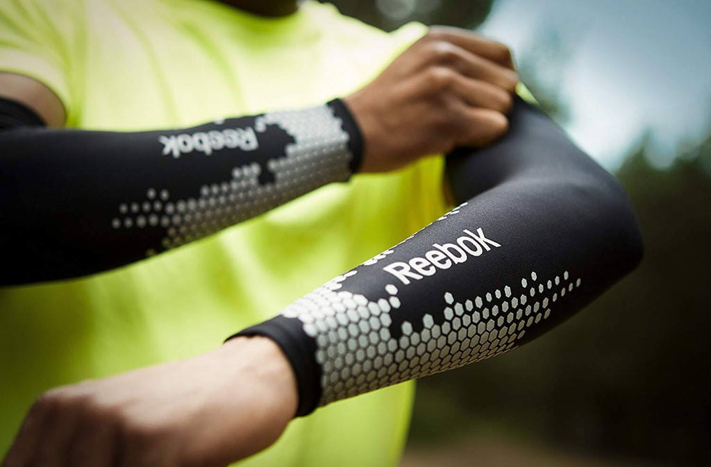 Person wearing Reebok Compression Arm Sleeves