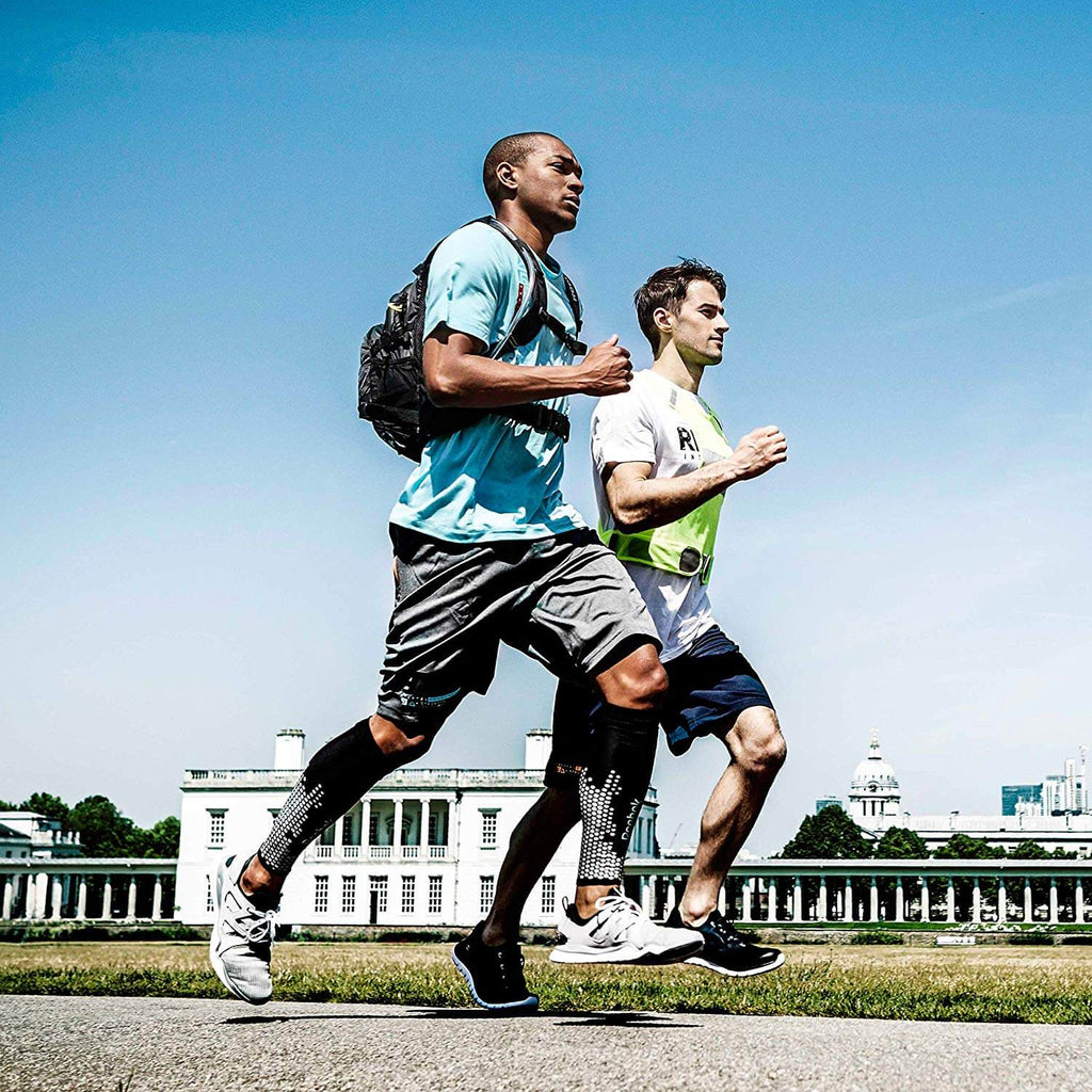 Two runners  wearing Reebok Compression Leg Sleeves