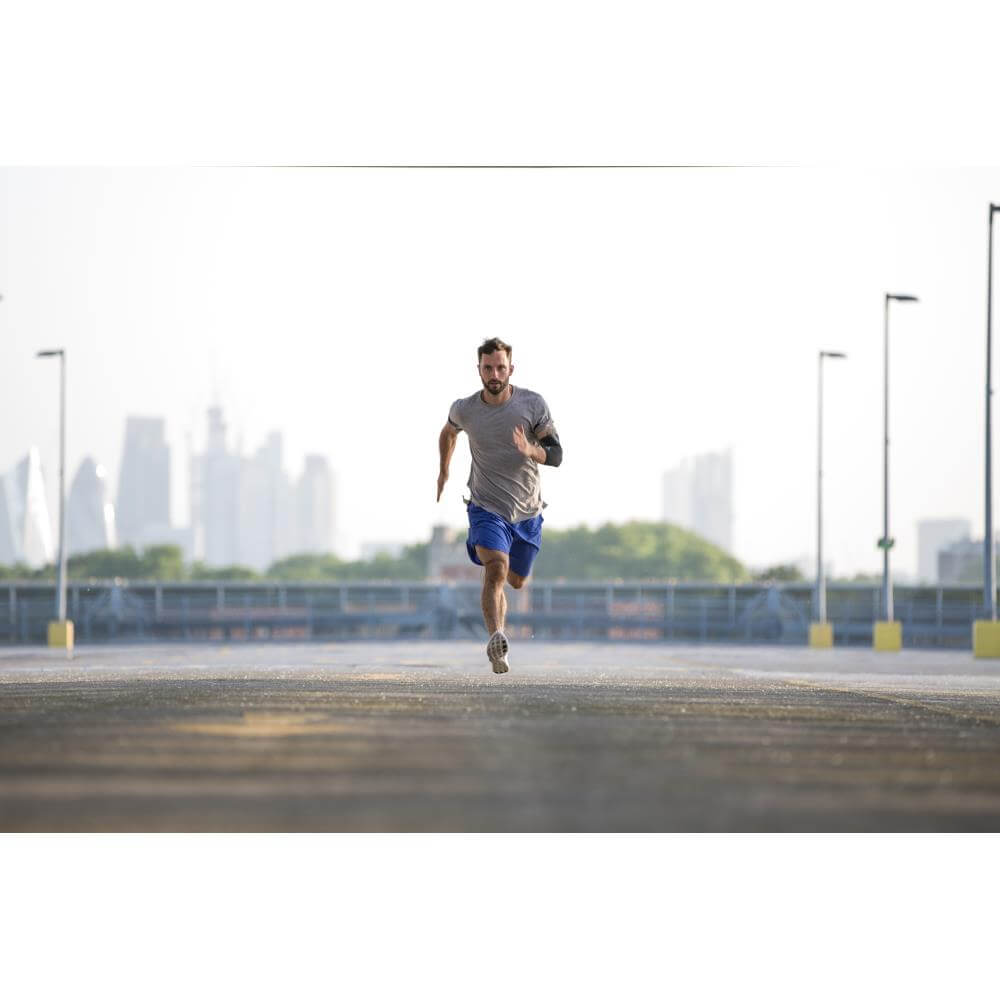Runner wearing a Reebok Elbow Support