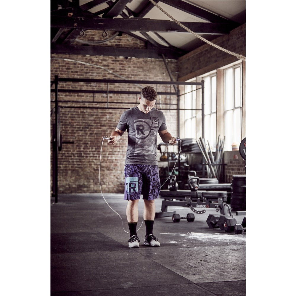 Man skipping in the gym with a Reebok Premium Speed Rope 
