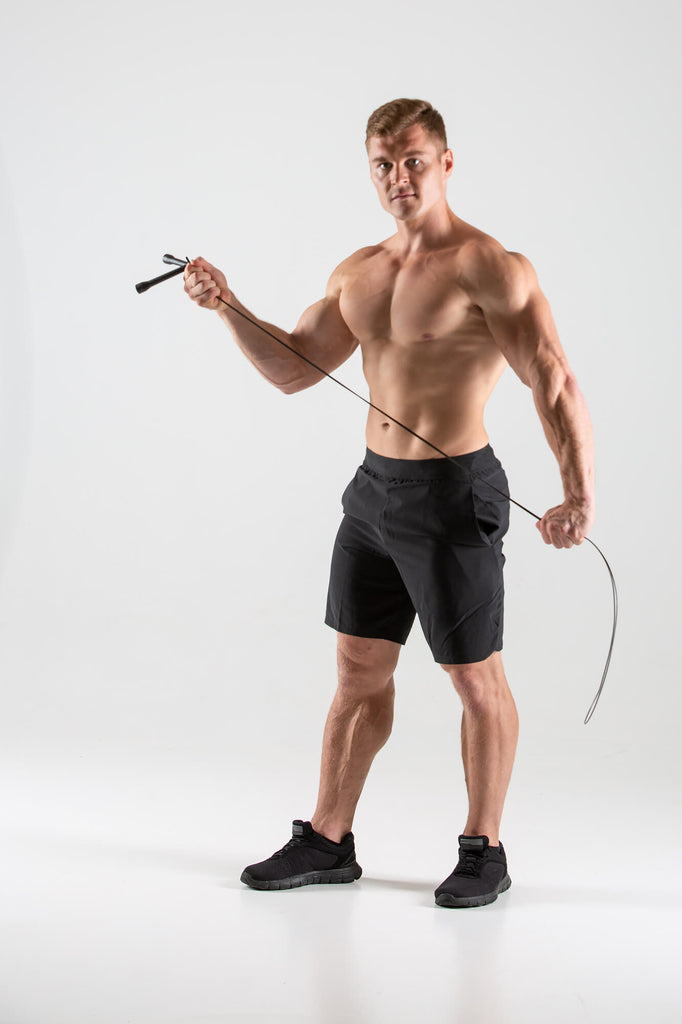 Man holding a UXT Adjustable Wire Speed Rope