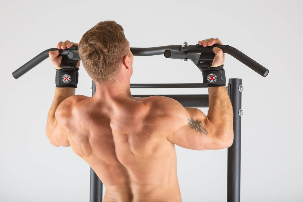Man performing pull ups using UXT Ultimate Grip Weight Lifting Hooks
