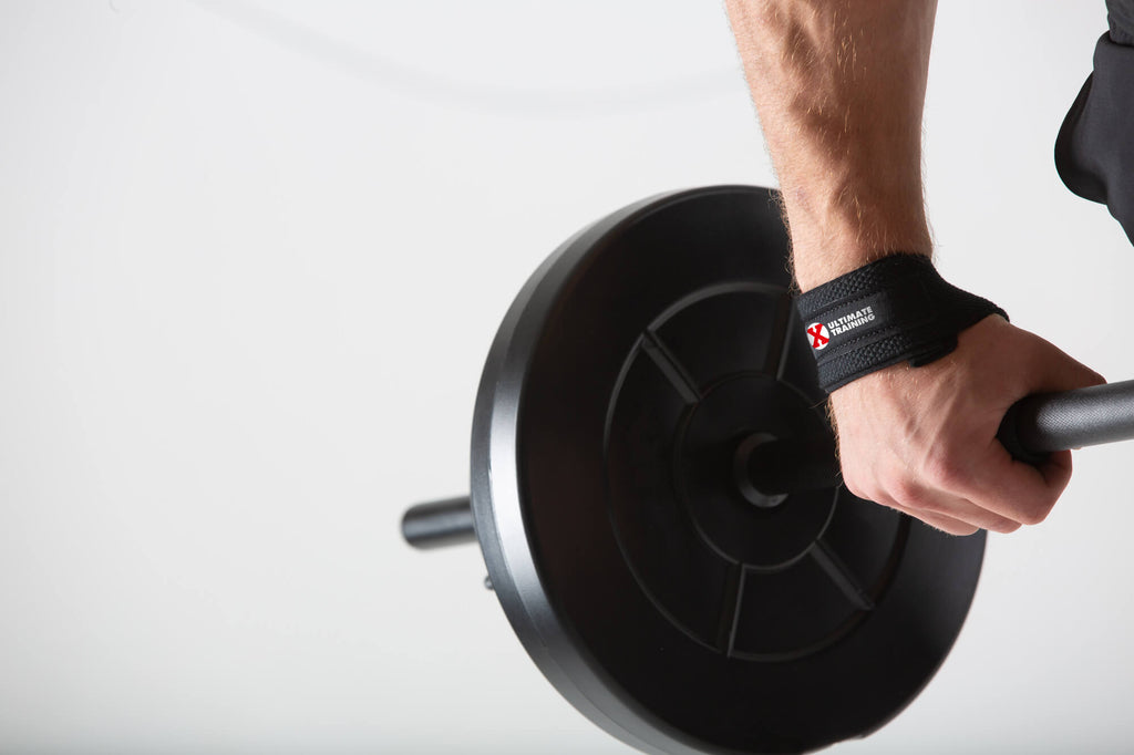 Man deadlifting wearing UXT Weight Lifting Straps with Comfort Pads
