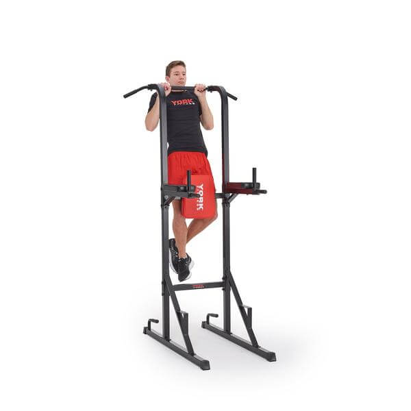 Man performs pull ups on the York Power Tower